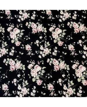 Tela di cotone stampata con fiori rosa su sfondo nero