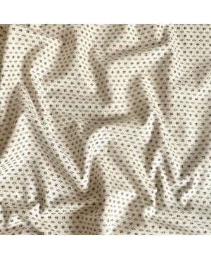 Takumi screen-printed cotton, small ecru motifs