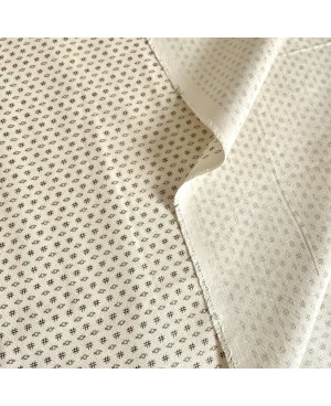 Takumi screen-printed cotton, small ecru motifs
