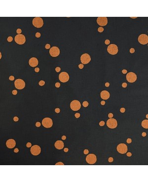 Takumi screen-printed cotton with large black/orange polka dots