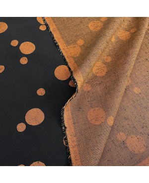 Takumi screen-printed cotton with large black/orange polka dots